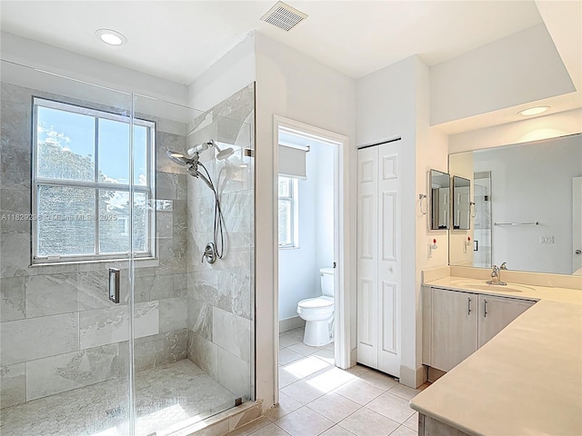 1568 SE 20th Ter, Homestead, FL 33035 - full bath with a shower stall, vanity, tile patterned flooring, a closet, and recessed lighting
