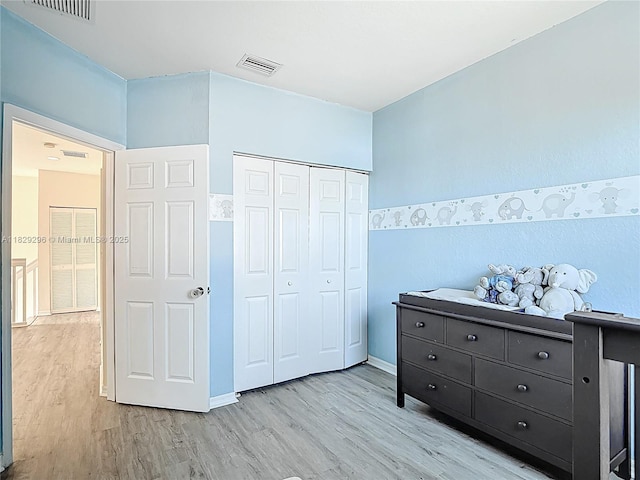 1568 SE 20th Ter, Homestead, FL 33035 - bedroom featuring light wood-style floors and a closet