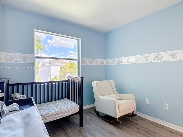 1568 SE 20th Ter, Homestead, FL 33035 - living area featuring wood finished floors and baseboards