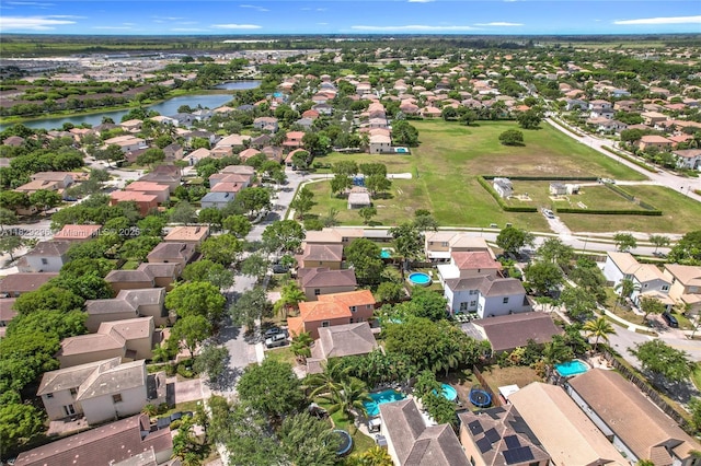 1568 SE 20th Ter, Homestead, FL 33035 - aerial view of property and surrounding area with nearby suburban area and a nearby body of water