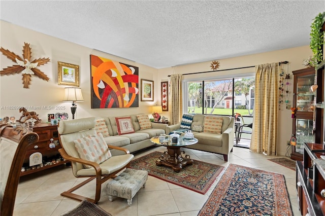 1507 Congressional Way Unit 1507, Deerfield Beach, FL 33442 - living room featuring light tile patterned floors and a textured ceiling