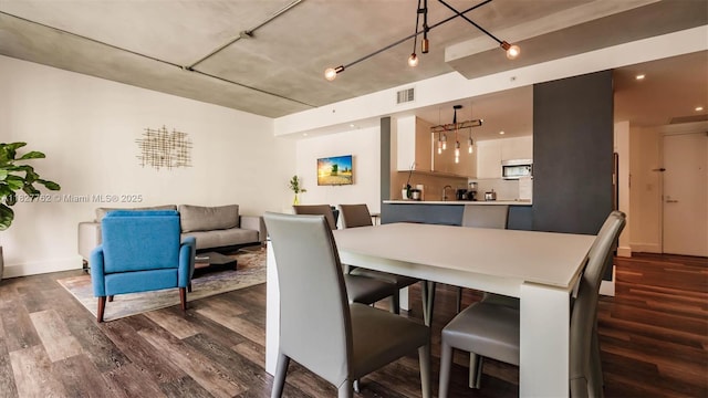 3250 NE 1st Ave Unit 1101, Miami, FL 33137 - dining area with dark wood-style floors and recessed lighting