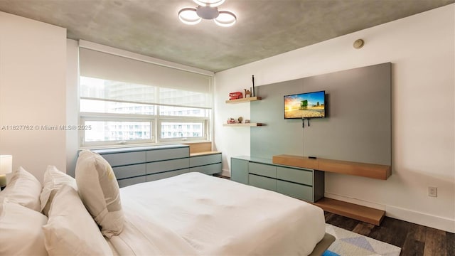 3250 NE 1st Ave Unit 1101, Miami, FL 33137 - bedroom with wood finished floors and baseboards
