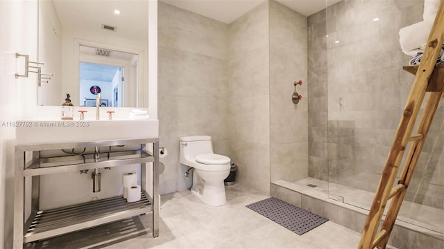 3250 NE 1st Ave Unit 1101, Miami, FL 33137 - full bathroom featuring toilet and tiled shower