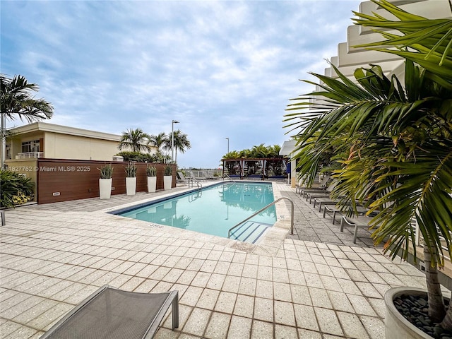 3250 NE 1st Ave Unit 1101, Miami, FL 33137 - community pool featuring a patio area