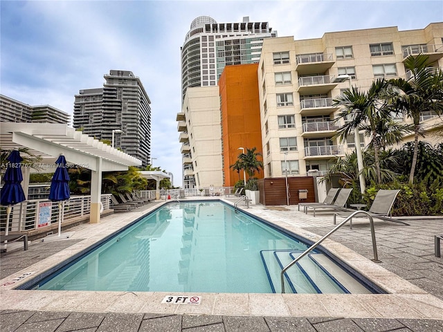 3250 NE 1st Ave Unit 1101, Miami, FL 33137 - community pool featuring a pergola and a patio area