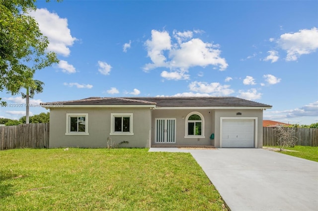 13225 SW 218th Ter, Miami, FL 33170 - view of front facade featuring an attached garage, stucco siding, and concrete driveway