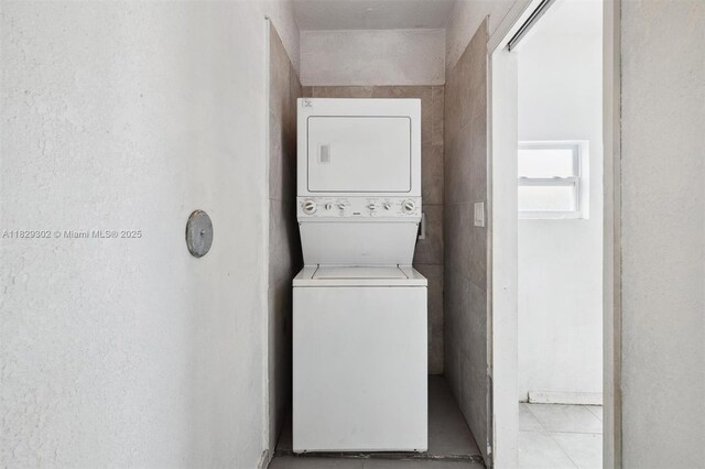 13225 SW 218th Ter, Miami, FL 33170 - washroom with stacked washer / drying machine and tile patterned floors