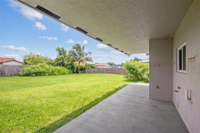 13225 SW 218th Ter, Miami, FL 33170 - view of yard with a patio