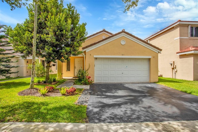 1611 Palermo Dr, Weston, FL 33327 - view of front of home with asphalt driveway, stucco siding, an attached garage, and a front lawn