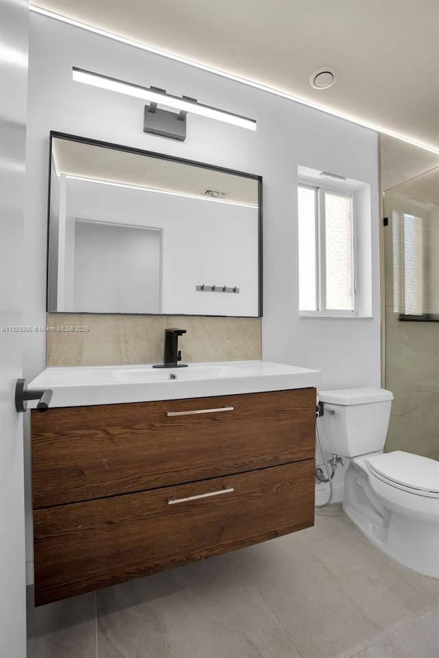 1611 Palermo Dr, Weston, FL 33327 - bathroom with vanity, a walk in shower, and tile patterned floors