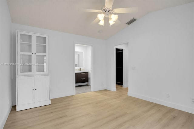 1611 Palermo Dr, Weston, FL 33327 - spare room featuring vaulted ceiling, a ceiling fan, and light wood finished floors