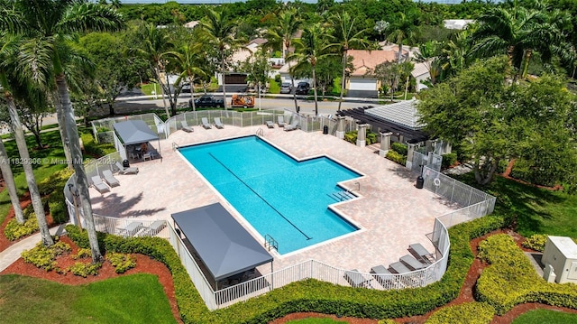 1611 Palermo Dr, Weston, FL 33327 - community pool with a patio area