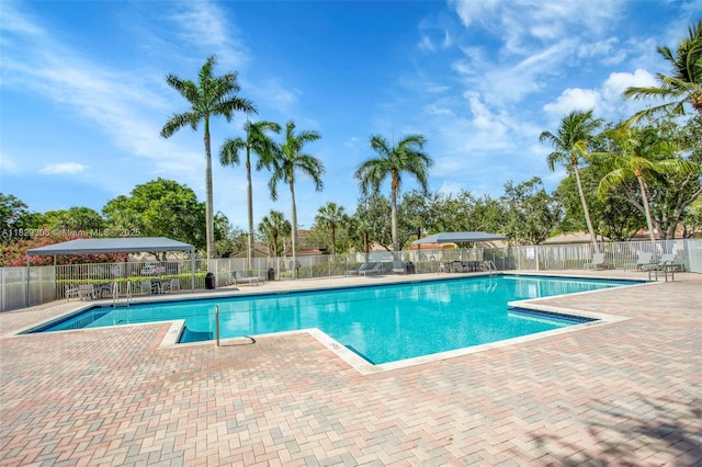 1611 Palermo Dr, Weston, FL 33327 - community pool featuring a patio area