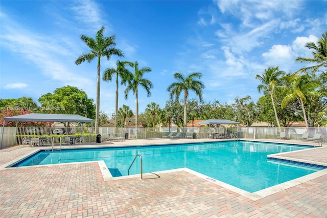 1611 Palermo Dr, Weston, FL 33327 - community pool with a patio area