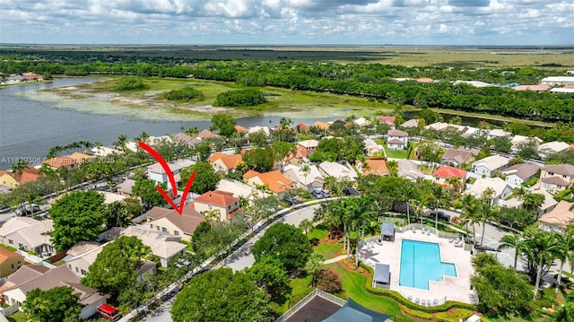 1611 Palermo Dr, Weston, FL 33327 - aerial perspective of suburban area with a nearby body of water and a pool