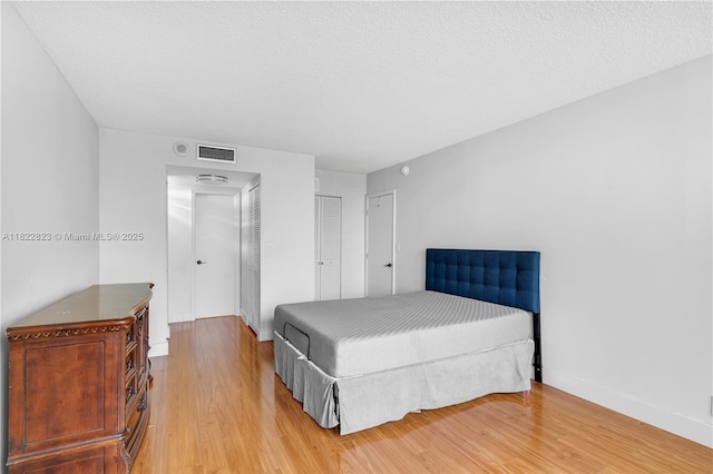 600 Three Islands Blvd Unit 310, Hallandale Beach, FL 33009 - bedroom featuring light wood-style floors and a closet