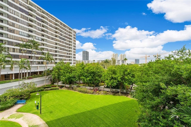 600 Three Islands Blvd Unit 310, Hallandale Beach, FL 33009 - view of community with a city view and a lawn