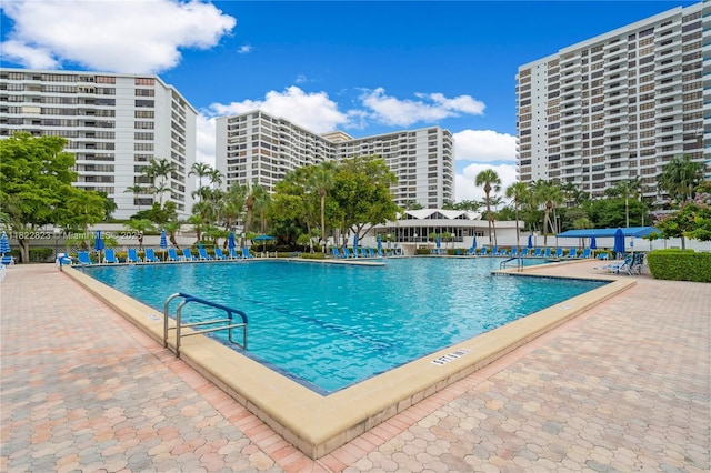 600 Three Islands Blvd Unit 310, Hallandale Beach, FL 33009 - community pool featuring a patio