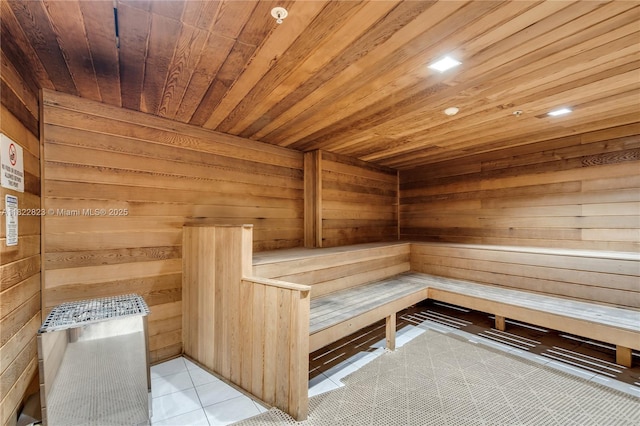 600 Three Islands Blvd Unit 310, Hallandale Beach, FL 33009 - sauna / steam room featuring wooden ceiling, wooden walls, and tile patterned flooring