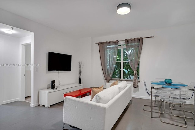 747 Michigan Ave Unit 201, Miami Beach, FL 33139 - living area featuring baseboards