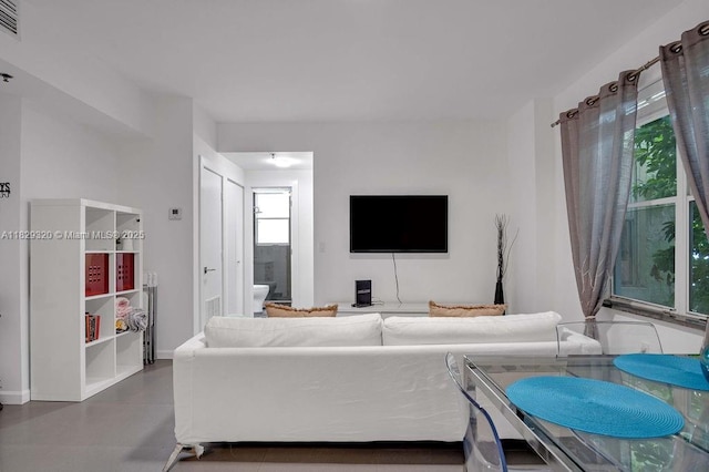 747 Michigan Ave Unit 201, Miami Beach, FL 33139 - living room featuring baseboards