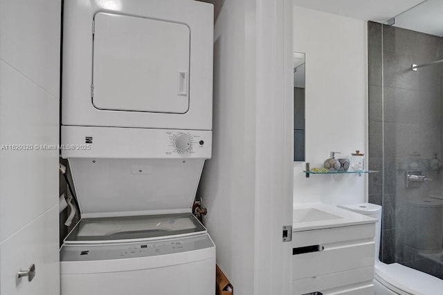 747 Michigan Ave Unit 201, Miami Beach, FL 33139 - washroom featuring stacked washer and clothes dryer