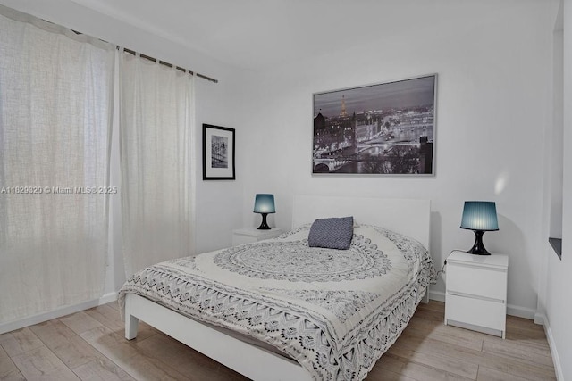747 Michigan Ave Unit 201, Miami Beach, FL 33139 - bedroom featuring wood finished floors