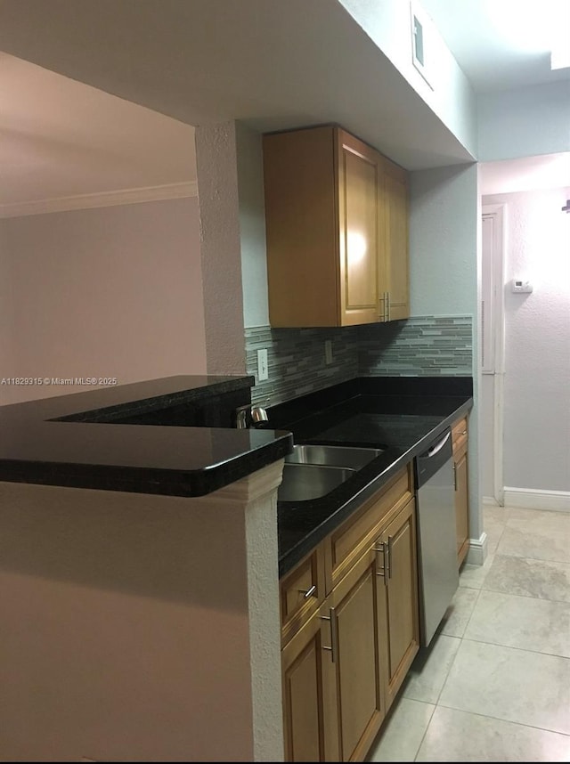 10670 SW 156th Pl Unit 309, Miami, FL 33196 - kitchen featuring stainless steel dishwasher, dark countertops, decorative backsplash, crown molding, and light tile patterned floors