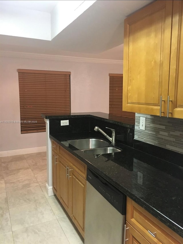 10670 SW 156th Pl Unit 309, Miami, FL 33196 - kitchen featuring dishwasher, tasteful backsplash, crown molding, light tile patterned floors, and dark stone countertops