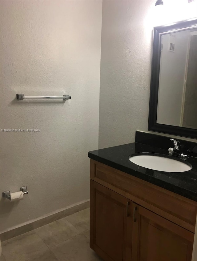 10670 SW 156th Pl Unit 309, Miami, FL 33196 - bathroom with vanity and tile patterned floors