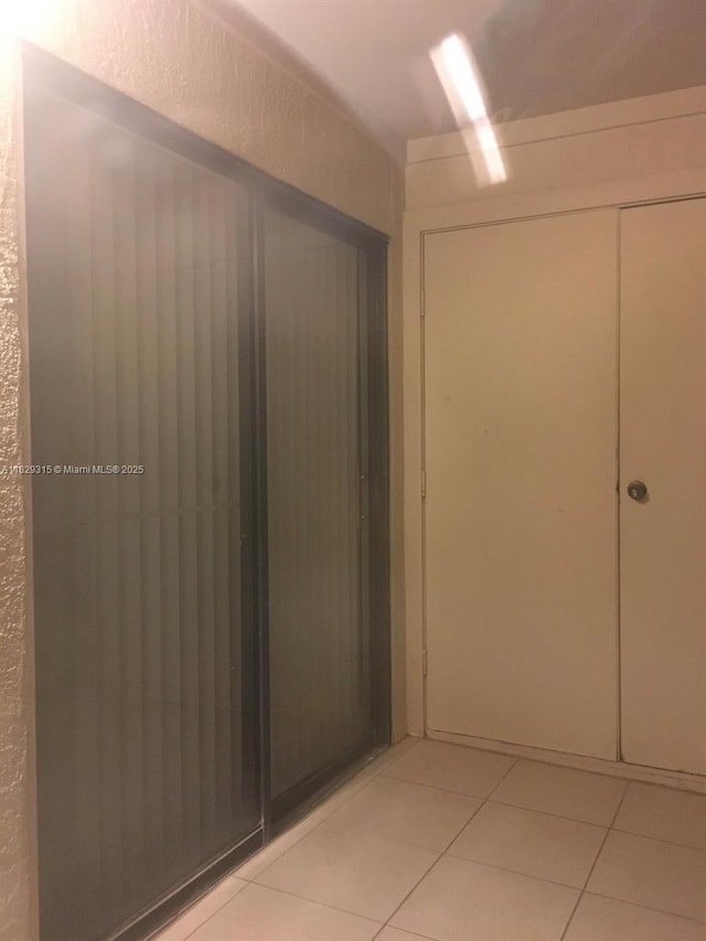 10670 SW 156th Pl Unit 309, Miami, FL 33196 - hall featuring light tile patterned floors