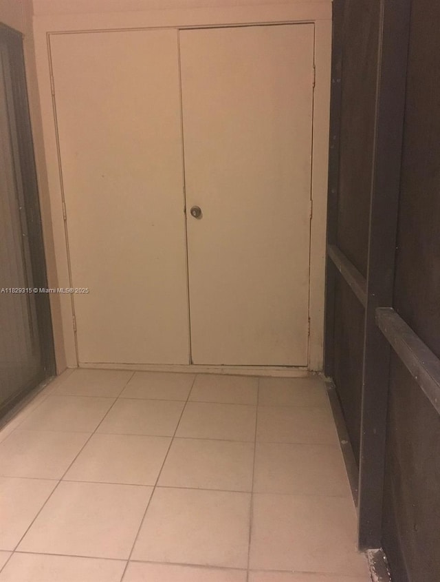 10670 SW 156th Pl Unit 309, Miami, FL 33196 - corridor with light tile patterned floors