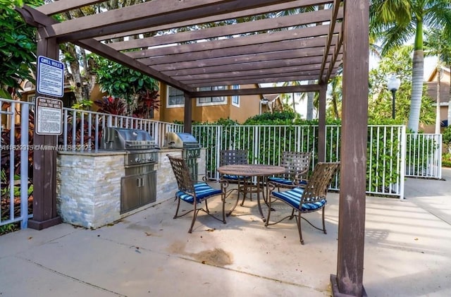 10670 SW 156th Pl Unit 309, Miami, FL 33196 - view of patio / terrace featuring exterior kitchen, a pergola, and outdoor dining area