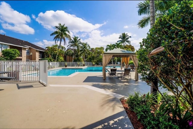 10670 SW 156th Pl Unit 309, Miami, FL 33196 - community pool featuring a gazebo and a patio