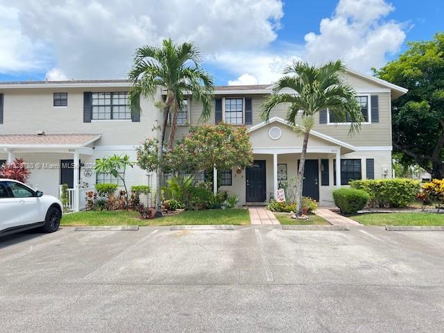 905 NW 107th Ave, Pembroke Pines, FL 33026 - multi unit property featuring uncovered parking and stucco siding