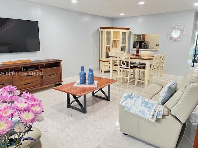 905 NW 107th Ave, Pembroke Pines, FL 33026 - living area featuring recessed lighting and light tile patterned floors