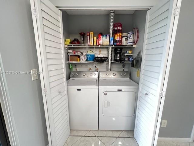 905 NW 107th Ave, Pembroke Pines, FL 33026 - laundry area featuring washing machine and clothes dryer and light tile patterned floors