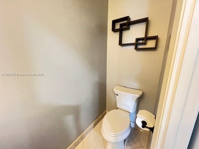 905 NW 107th Ave, Pembroke Pines, FL 33026 - bathroom featuring toilet and tile patterned floors