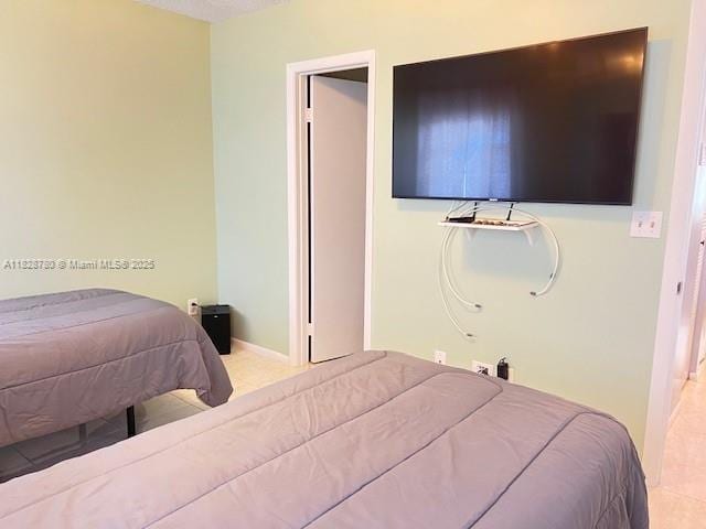 905 NW 107th Ave, Pembroke Pines, FL 33026 - bedroom featuring baseboards