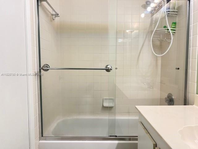 905 NW 107th Ave, Pembroke Pines, FL 33026 - bathroom with enclosed tub / shower combo and vanity