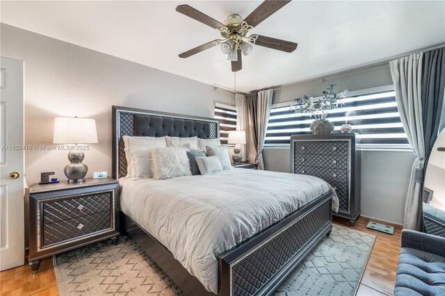 8065 W 14th Ct, Hialeah, FL 33014 - bedroom featuring light wood-style floors and ceiling fan