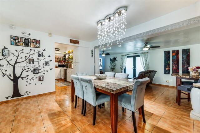 8065 W 14th Ct, Hialeah, FL 33014 - dining area with light tile patterned flooring, ceiling fan, and french doors