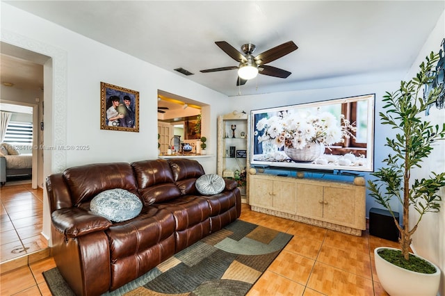 8065 W 14th Ct, Hialeah, FL 33014 - living room with light tile patterned floors and a ceiling fan