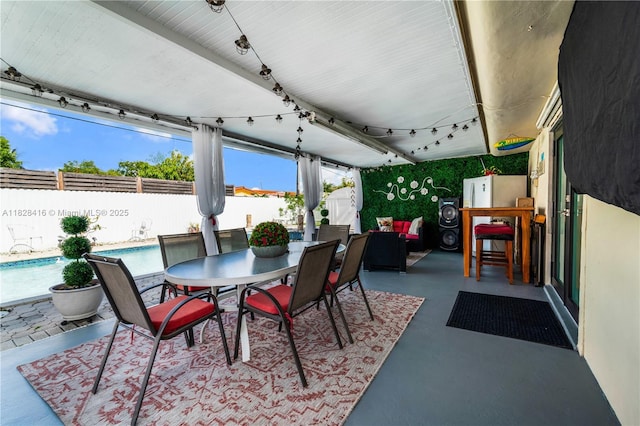 8065 W 14th Ct, Hialeah, FL 33014 - fenced backyard with outdoor dining area and a patio area