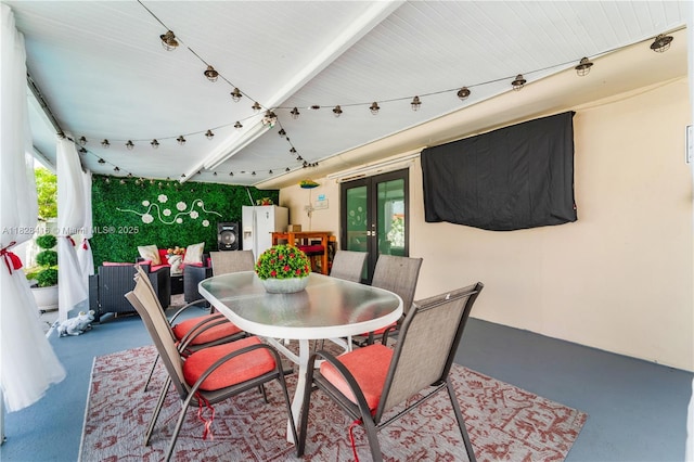 8065 W 14th Ct, Hialeah, FL 33014 - view of patio / terrace with french doors, outdoor dining space, and washer / dryer