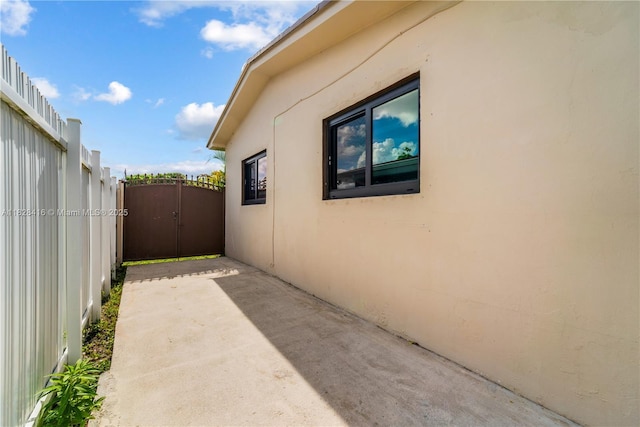 8065 W 14th Ct, Hialeah, FL 33014 - view of patio / terrace with a gate