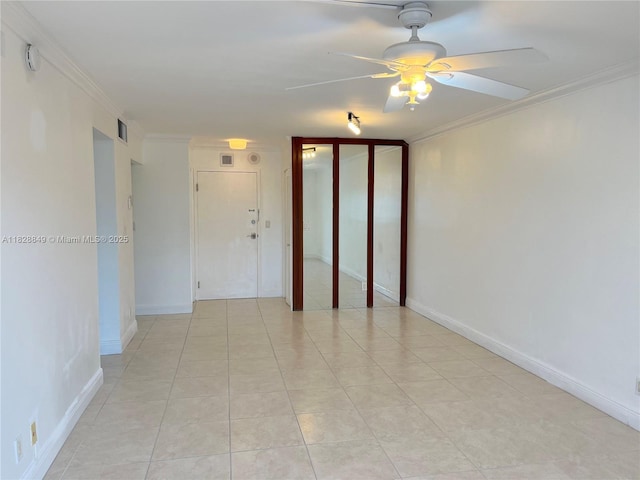 900 NE 18th Ave Unit 304, Fort Lauderdale, FL 33304 - empty room featuring a ceiling fan, crown molding, and a smoke detector