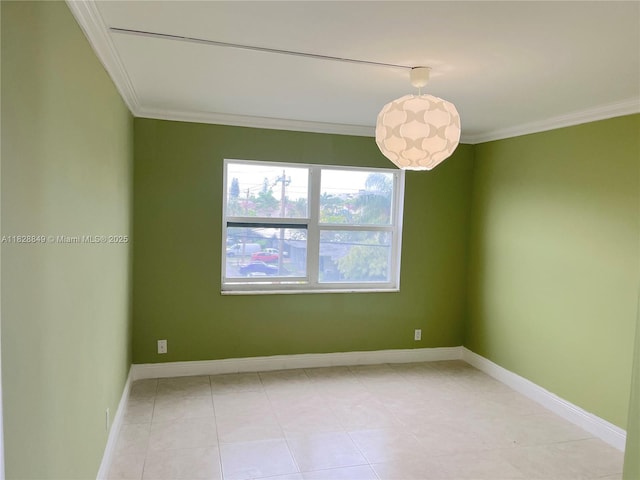 900 NE 18th Ave Unit 304, Fort Lauderdale, FL 33304 - empty room featuring ornamental molding and light tile patterned floors