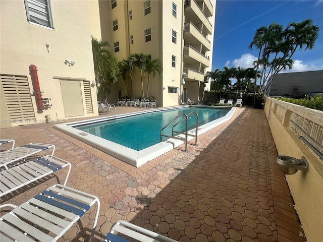 900 NE 18th Ave Unit 304, Fort Lauderdale, FL 33304 - community pool featuring a patio area